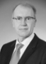Dir. Hans-Werner Behrens, Vorsitzender der 1. Vergabekammer des Bundes